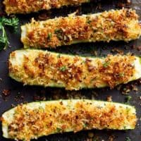 Parmesan Crusted Zucchini are easy to make and are one of THE best ways to enjoy zucchini! Crispy and crunchy, the perfect side dish OR snack! | https://cafedelites.com