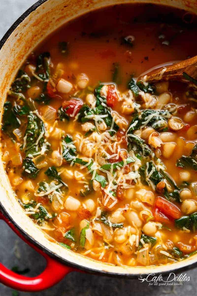 White Bean Parmesan Spinach Soup ready in 10 minutes is may kind of soup! Make a double batch and have plenty of leftovers for the weekly dinner rush! | https://cafedelites.com