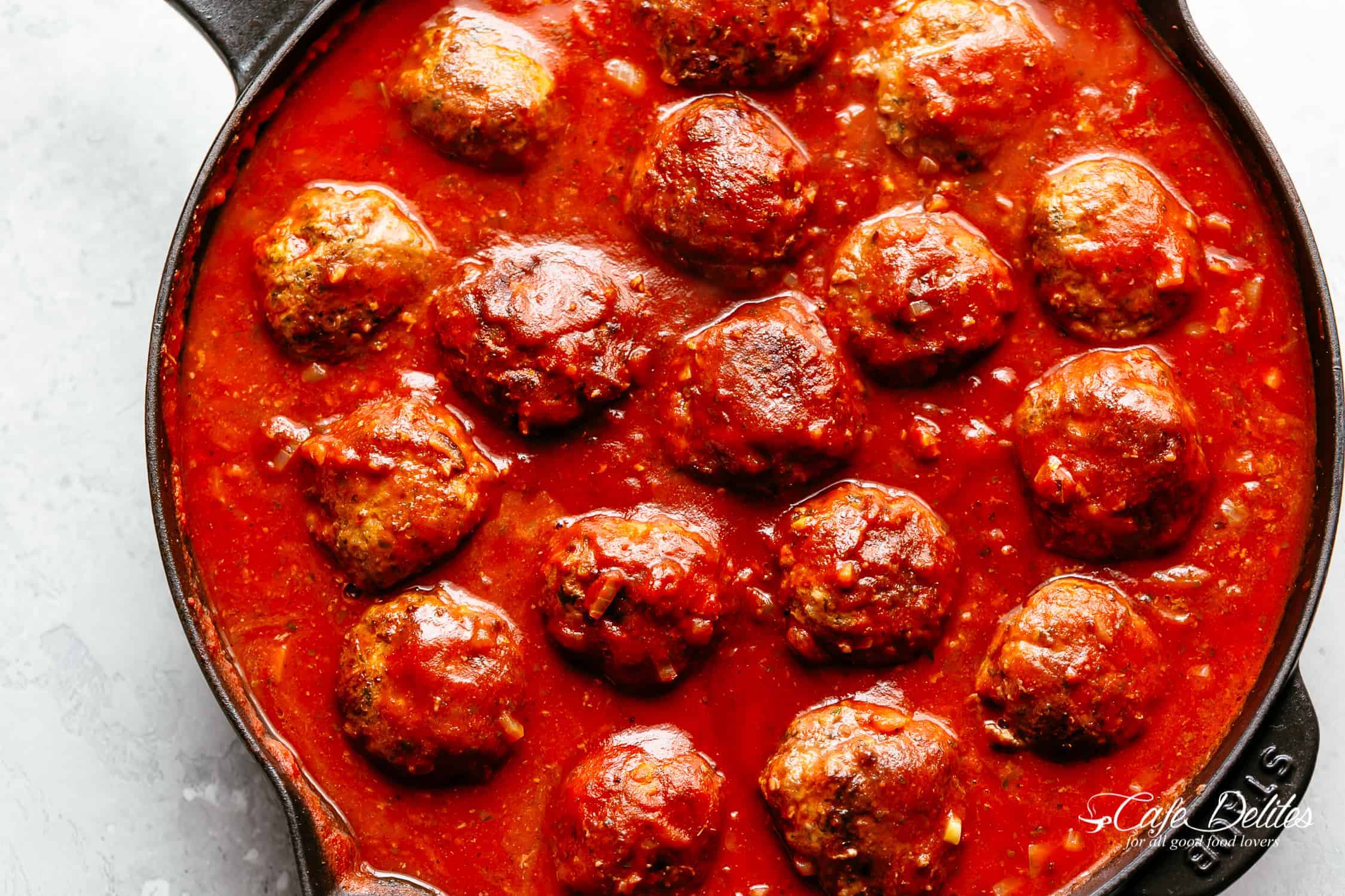  simmered in a rustic homemade tomato sauce Cheesy Meatballs