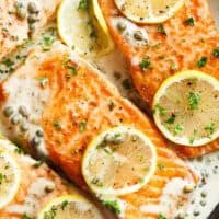 Creamy Lemon Garlic Salmon Piccata is a classy yet easy salmon recipe you've been waiting for, with a delicious creamy lemon caper sauce! | https://cafedelites.com