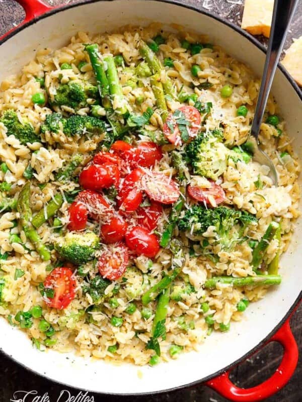 One Pot Orzo Primavera is full of green vegetables and a beautiful sauce with a hint of cream, garlic and lemon!