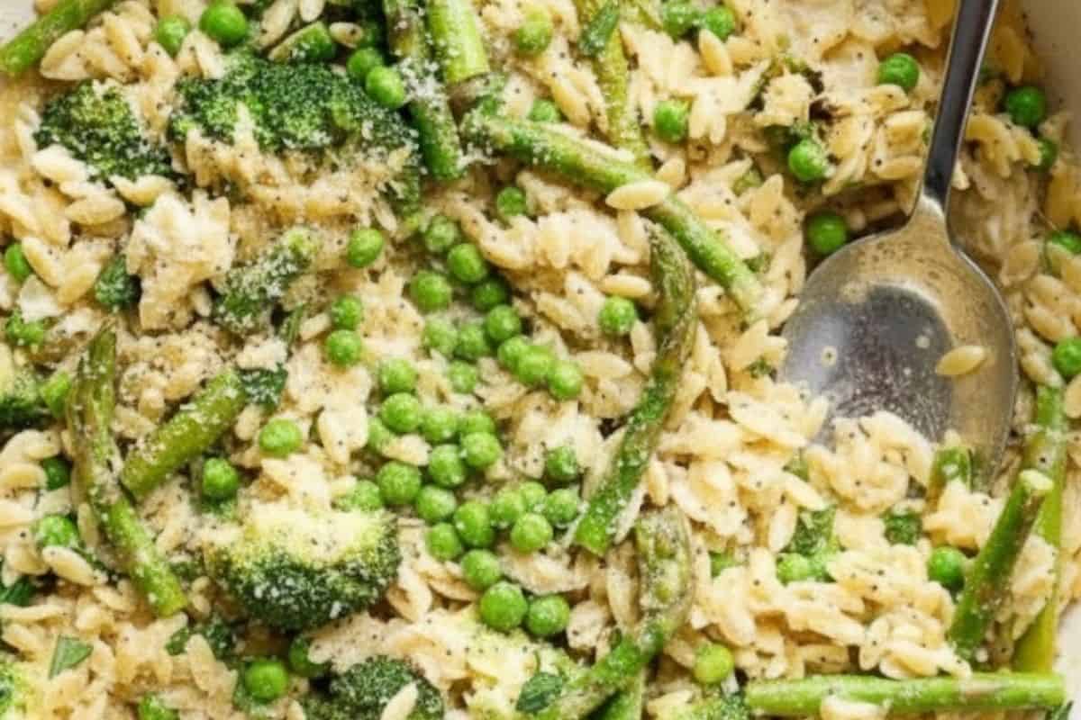 Gently fold in peas and Parmesan cheese. Cook for 2-3 minutes until peas are tender and cheese melts.