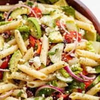 Lemon Herb Mediterranean Pasta Salad is loaded with so many Mediterranean salad ingredients, and drizzled an incredible Lemon Herb dressing! | https://cafedelites.com