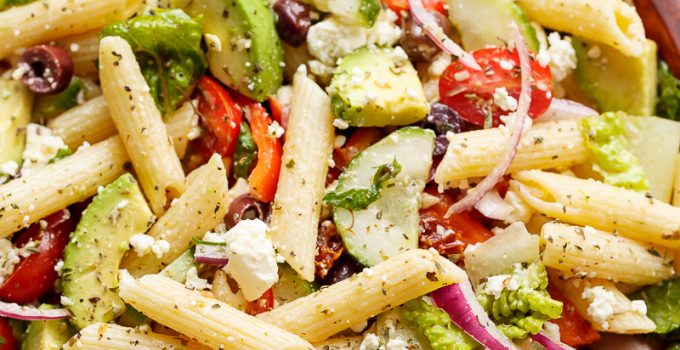 Lemon Herb Mediterranean Pasta Salad is loaded with so many Mediterranean salad ingredients, and drizzled an incredible Lemon Herb dressing! | https://cafedelites.com
