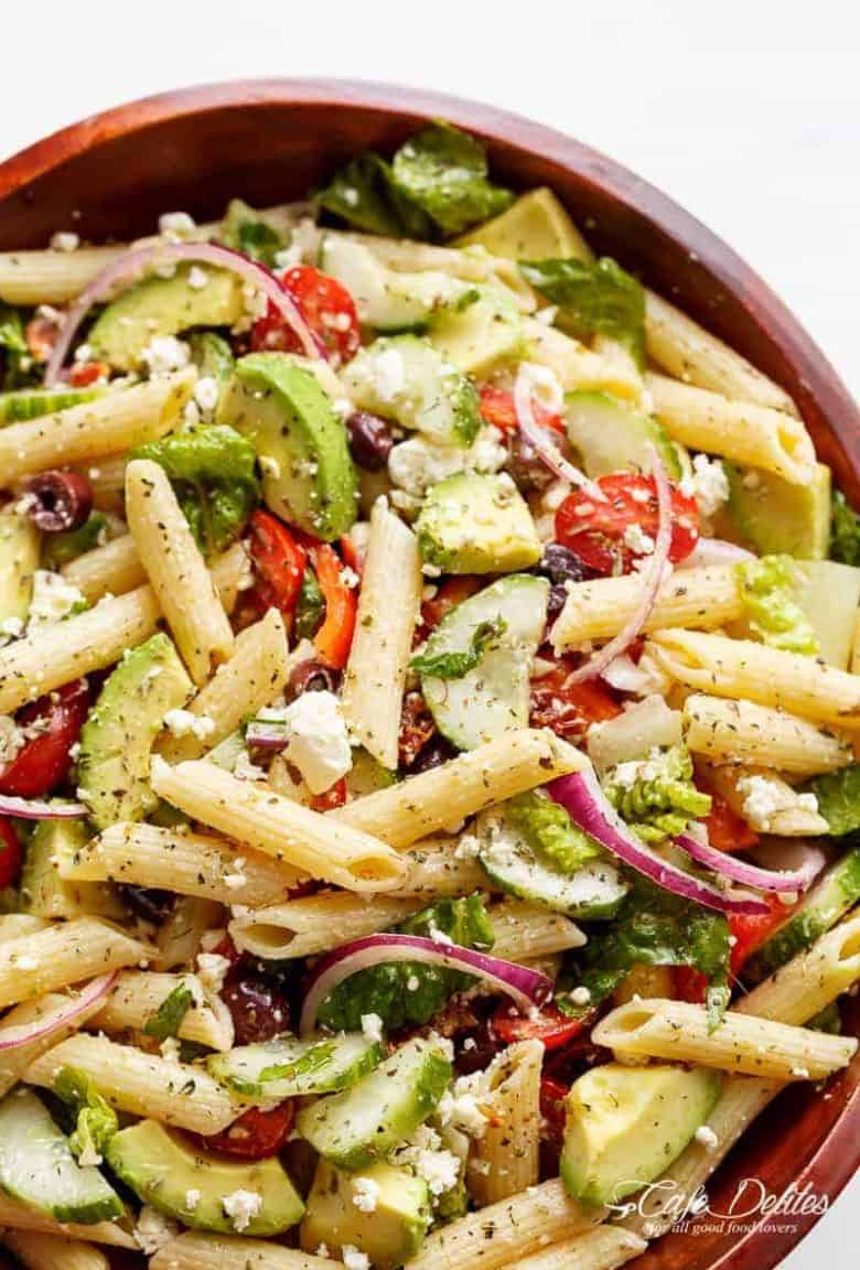 Lemon Herb Mediterranean Pasta Salad is loaded with so many Mediterranean salad ingredients, and drizzled an incredible Lemon Herb dressing! | https://cafedelites.com