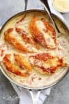 Creamy Parmesan Carbonara Chicken is the ultimate twist! Crispy, golden chicken fillets in a carbonara inspired sauce for a new favourite chicken recipe! | https://cafedelites.com