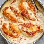 Creamy Parmesan Carbonara Chicken is the ultimate twist! Crispy, golden chicken fillets in a carbonara inspired sauce for a new favourite chicken recipe! | https://cafedelites.com