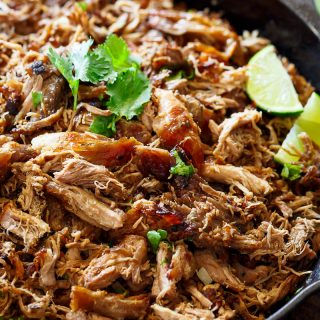 Crispy Pork Carnitas (Mexican Slow Cooked Pulled Pork) is a winner! The closest recipe to authentic Mexican Carnitas (NO LARD), with a perfect crisp finish! | https://cafedelites.com