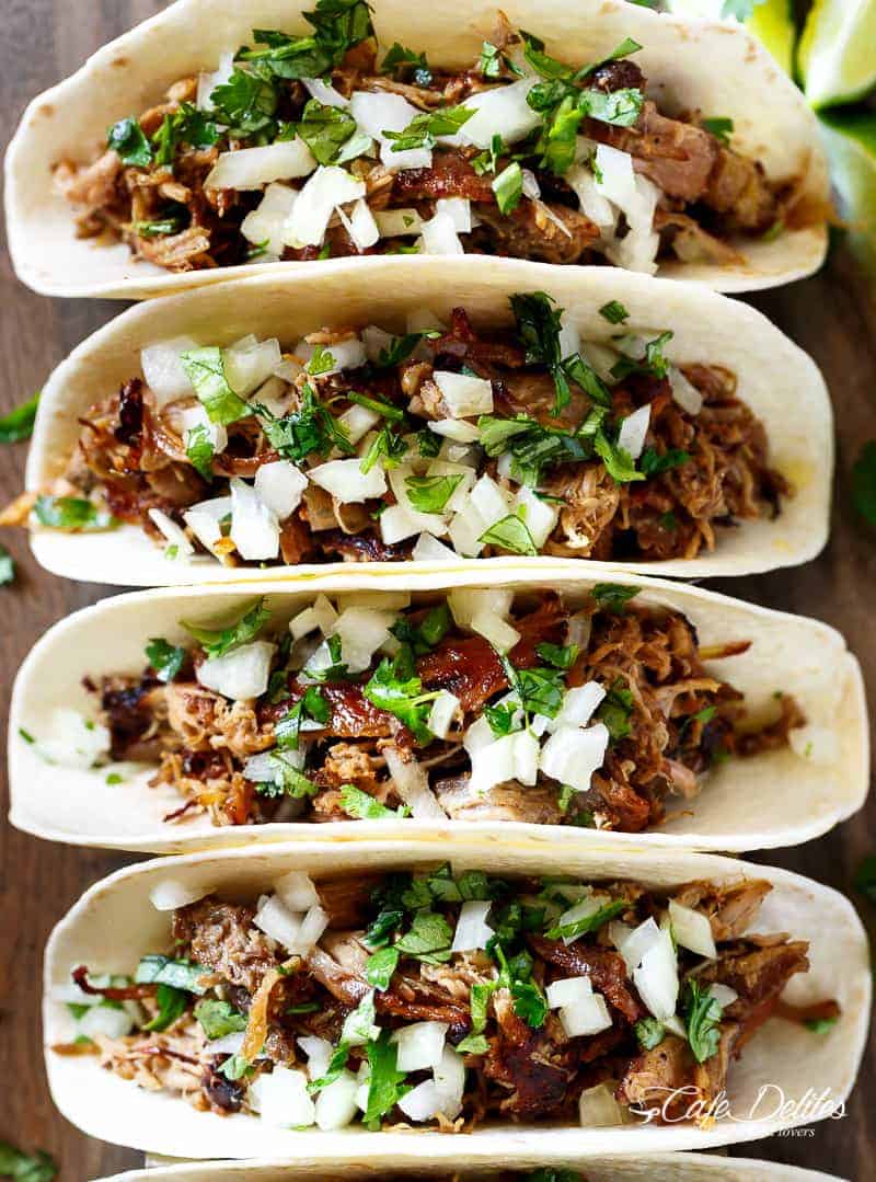 Crispy Pork Carnitas (Mexican Slow Cooked Pulled Pork) is a winner! The closest recipe to authentic Mexican Carnitas (NO LARD), with a perfect crisp finish! | https://cafedelites.com