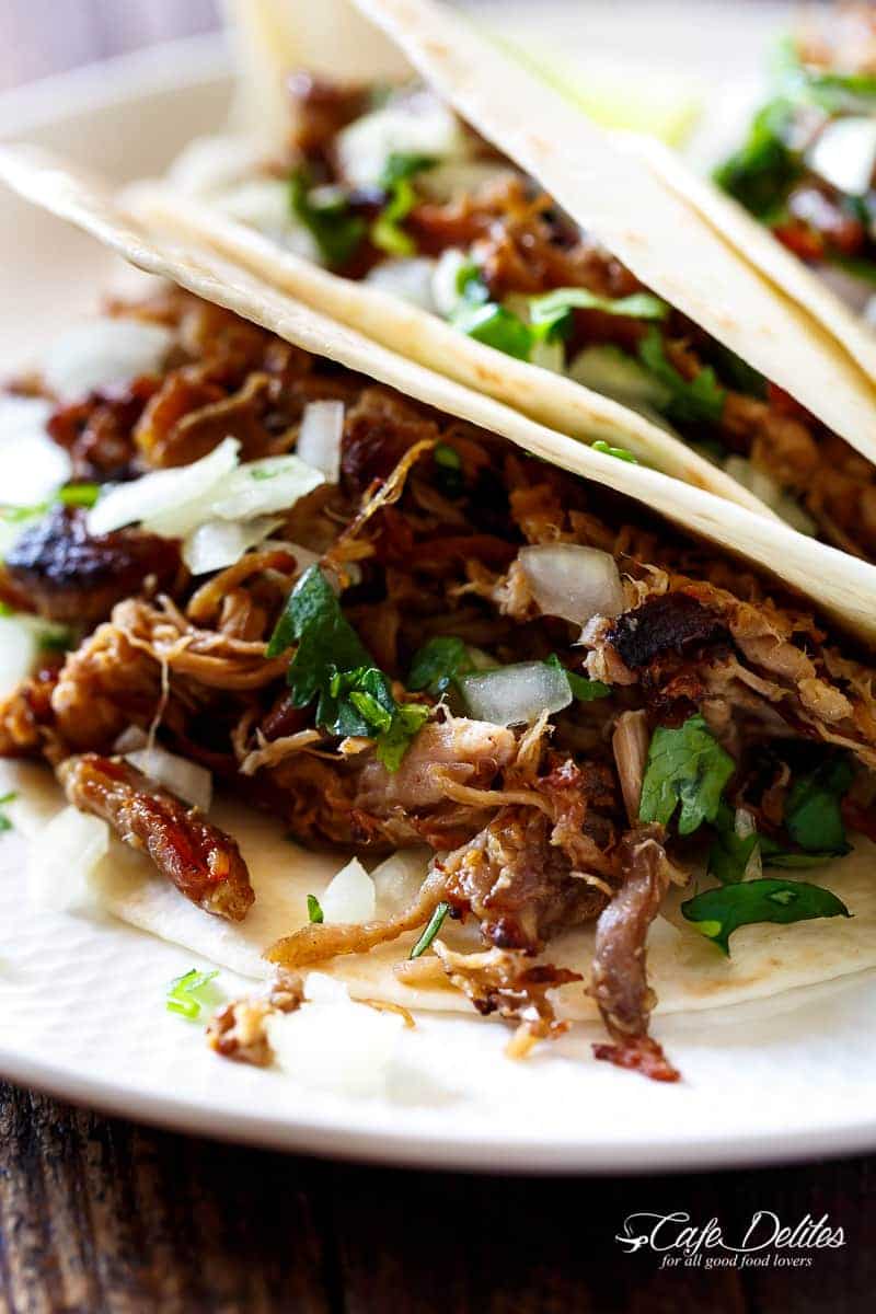 Crispy Pork Carnitas (Mexican Slow Cooked Pulled Pork) is a winner! The closest recipe to authentic Mexican Carnitas (NO LARD), with a perfect crisp finish! | https://cafedelites.com