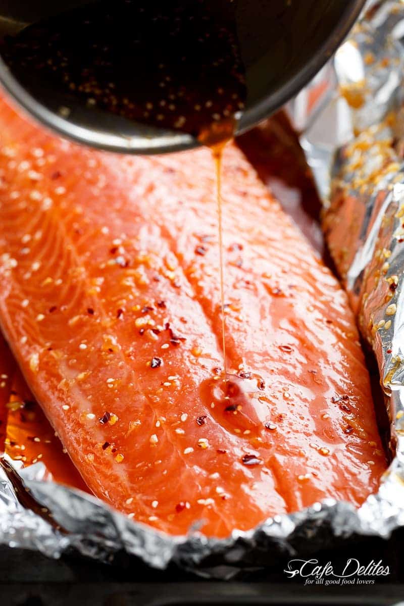 Honey Sesame Salmon In Foil is ready in under 20 minutes! Full of Asian flavours with ingredients you have in your kitchen, and so easy to pull together! | https://cafedelites.com