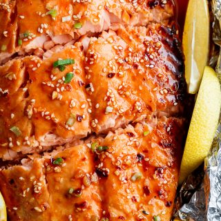 Honey Sesame Salmon In Foil is ready in under 20 minutes! Full of Asian flavours with ingredients you have in your kitchen, and so easy to pull together! | https://cafedelites.com