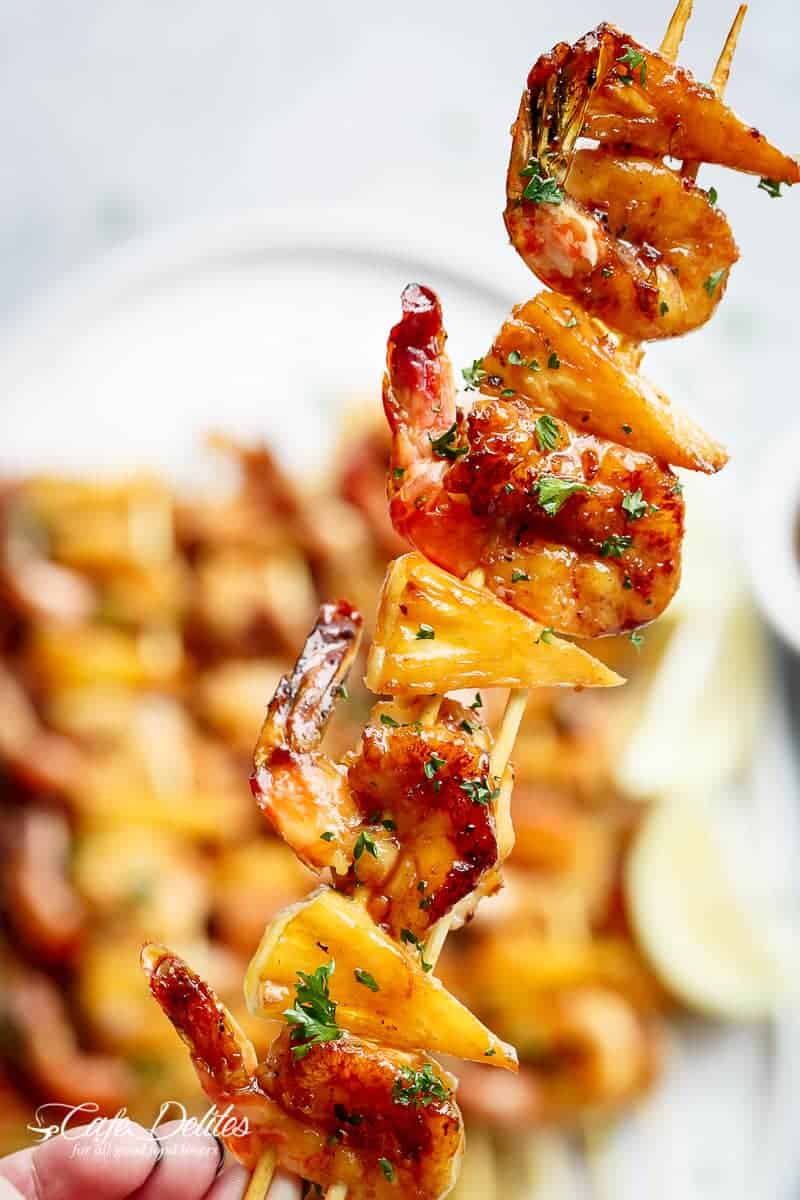 Honey Garlic Butter Shrimp Pineapple Skewers are easy to make and cooked or grilled in an  Honey Garlic Butter Shrimp Pineapple Skewers