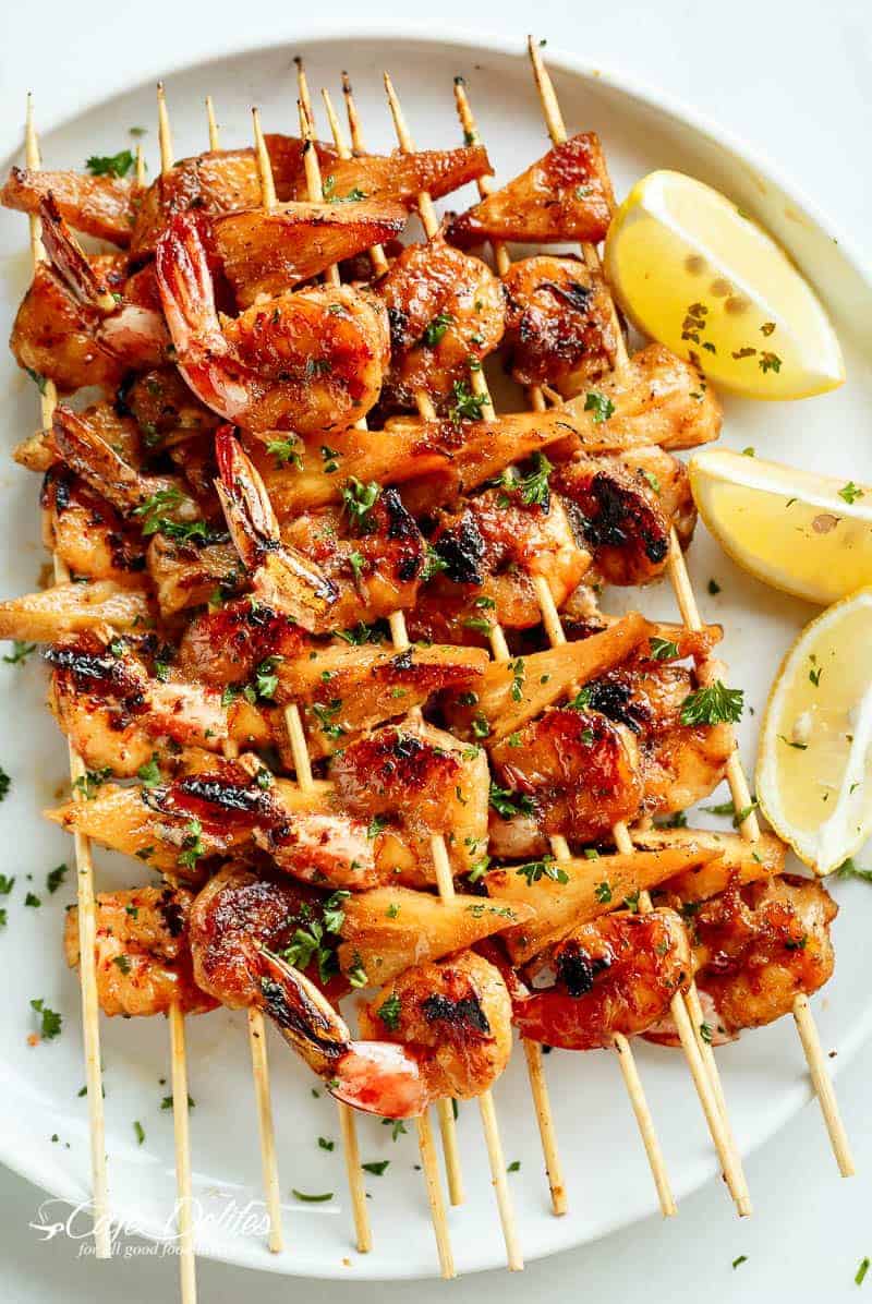 Honey Garlic Butter Shrimp Pineapple Skewers are easy to make and cooked or grilled in an  Honey Garlic Butter Shrimp Pineapple Skewers