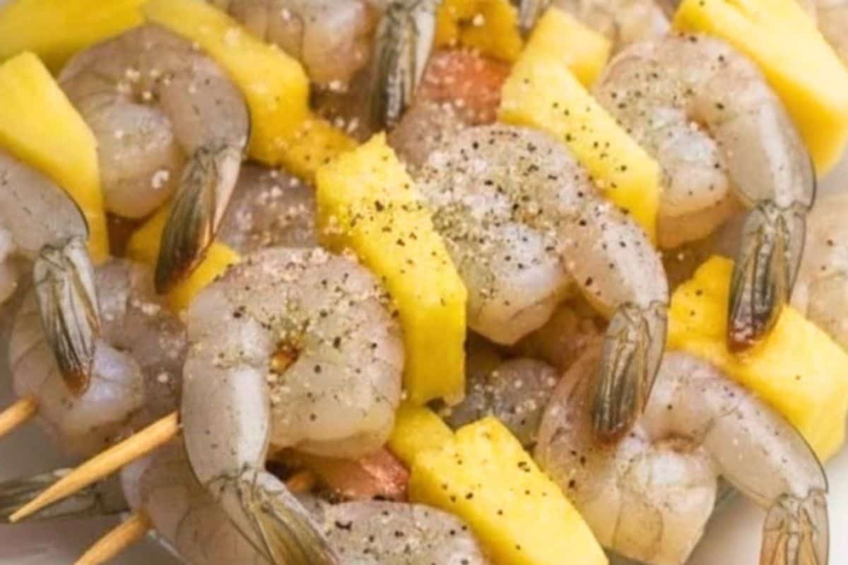 Lightly sprinkle shrimp with salt and cracked pepper