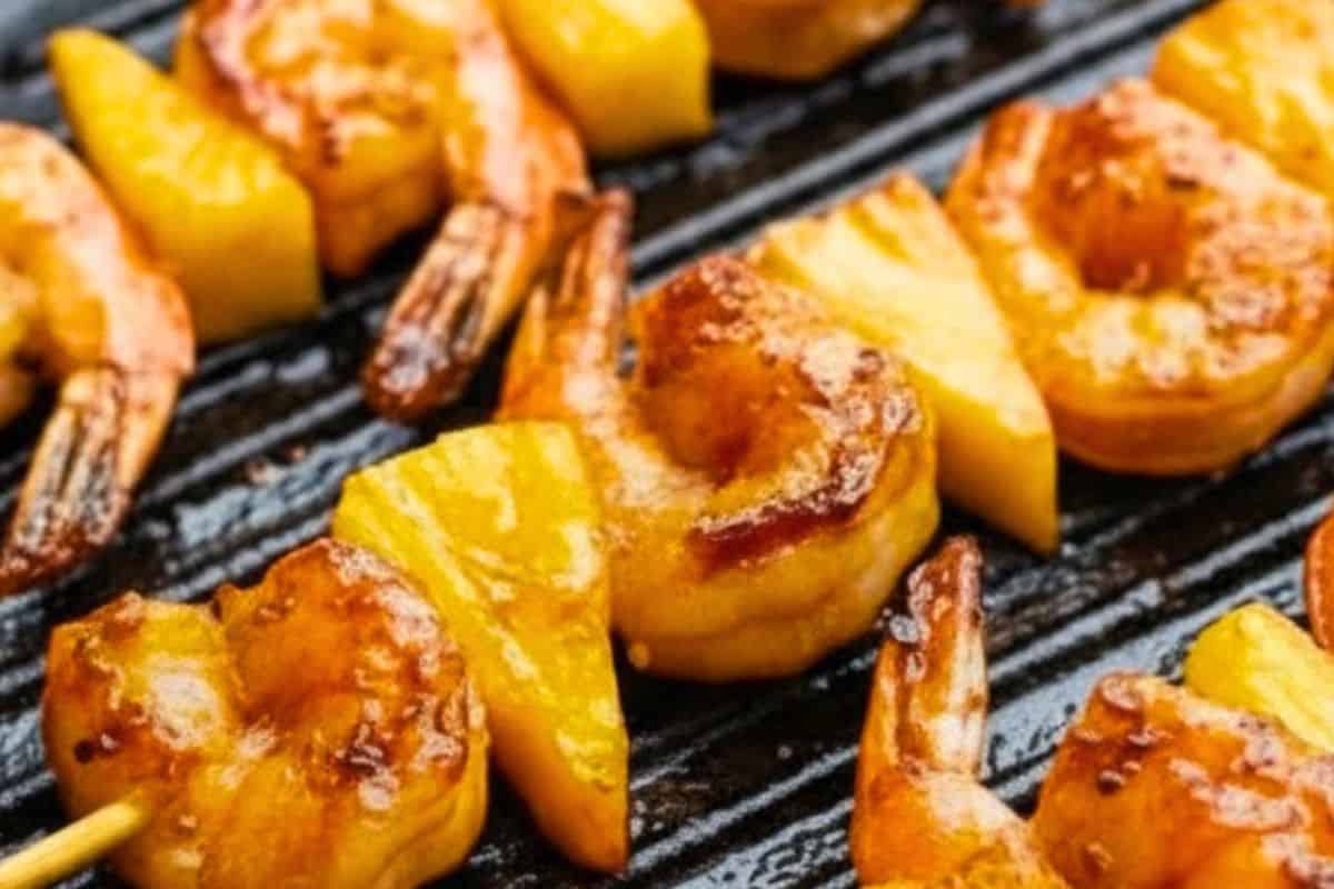 Heat the remaining butter in a large skillet or grill pan over medium heat. Cook skewers in batches for 3–4 minutes per side