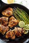 One Pan Lemon Thyme Chicken Asparagus is a super easy 'throw-together' recipe. Healthy and made with only a handful of uncomplicated ingredients! | https://cafedelites.com