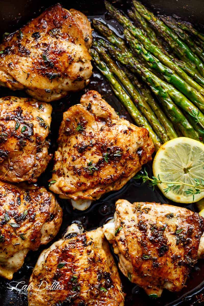 One Pan Lemon Thyme Chicken Asparagus is a super easy 'throw-together' recipe. Made with only a handful of uncomplicated ingredients! | https://cafedelites.com