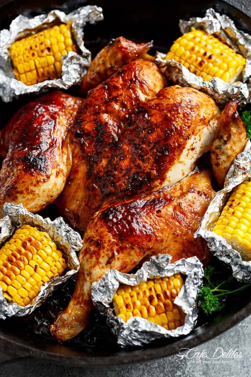 Bring your favourite Nando's chicken to the table with this Portuguese BBQ Peri Peri Chicken Recipe! PLUS the addition of juicy corn cobs in foil packets are charred for added flavour. | https://cafedelites.com