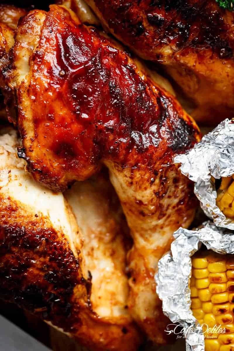 Bring your favourite Nando's chicken to the table with this Portuguese BBQ Peri Peri Chicken Recipe! PLUS the addition of juicy corn cobs in foil packets are charred for added flavour. | https://cafedelites.com