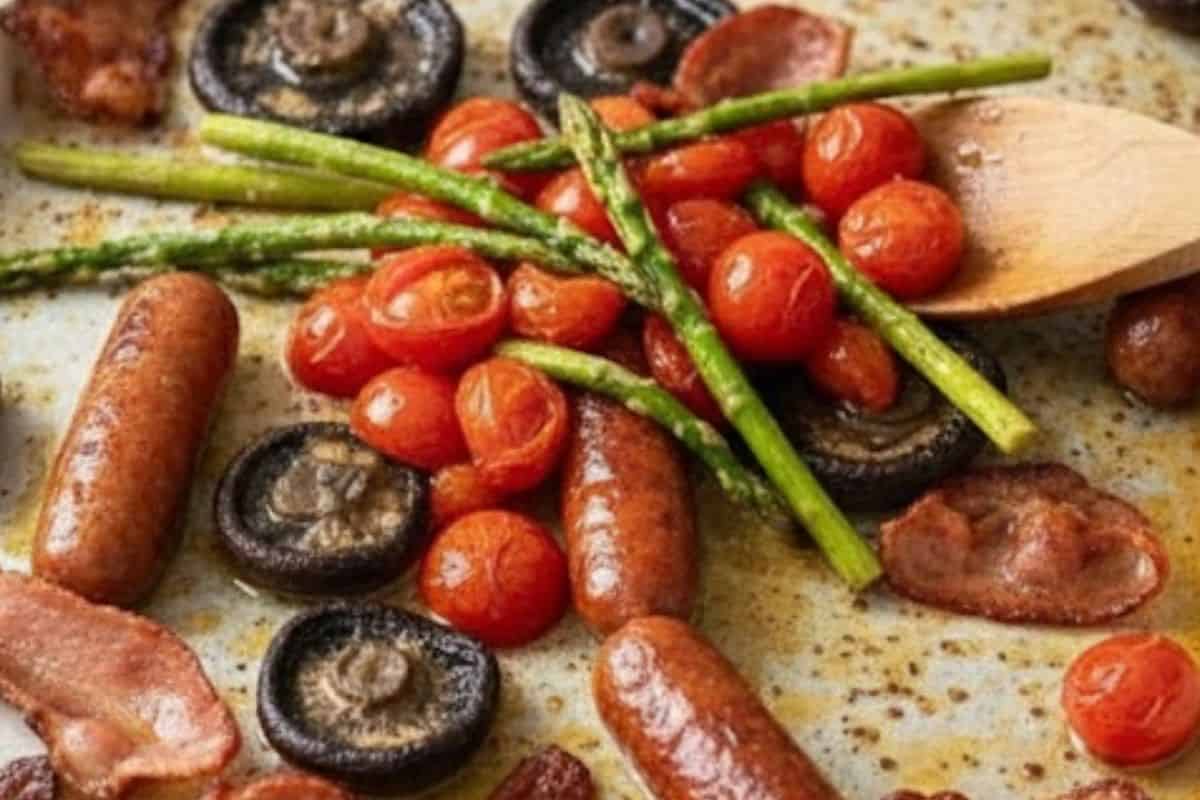 Remove the tray from the oven and add the tomatoes and asparagus