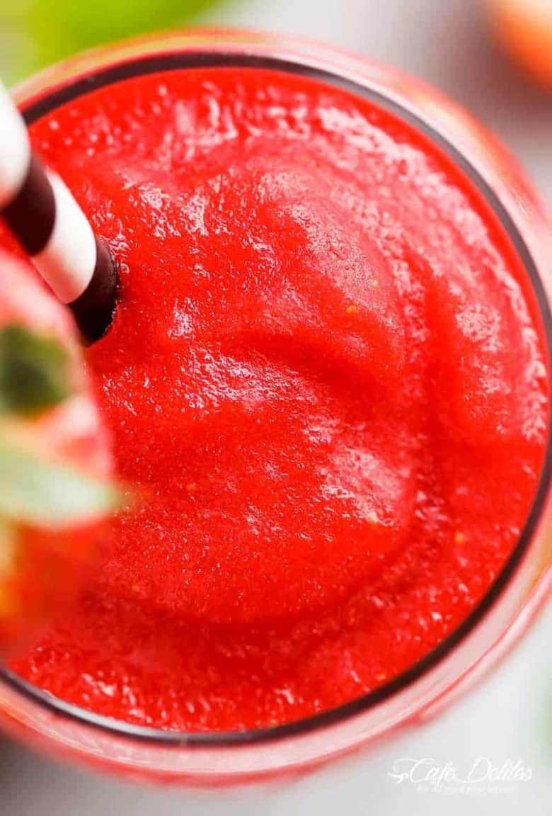 Strawberry Rosé Slushies is THE best way to BEAT THE HEAT! If you love a great drink, this 2-ingredient slushy is for you! | https://cafedelites.com