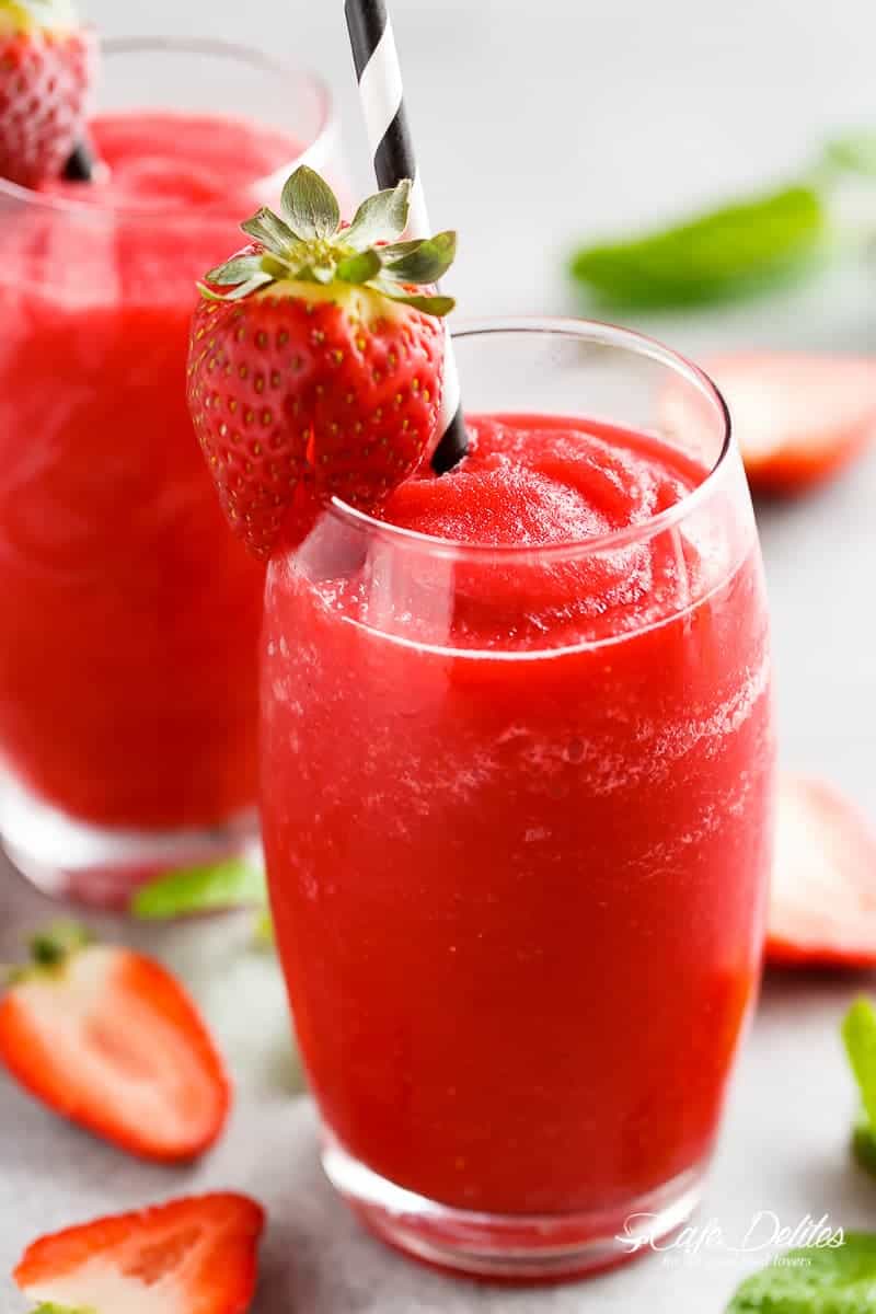 Strawberry Rosé Slushies is THE best way to BEAT THE HEAT! If you love a great drink, this 2-ingredient slushy is for you! | https://cafedelites.com