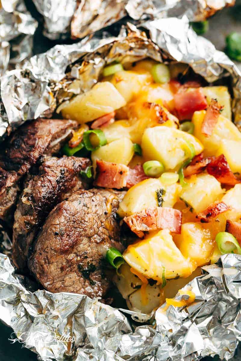 Steak & Cheesy Bacon Potato Hash Foil Packs can be cooked on the grill, stove top OR oven! Two favourites cooked in ONE PACK means NO pans to wash up! | https://cafedelites.com