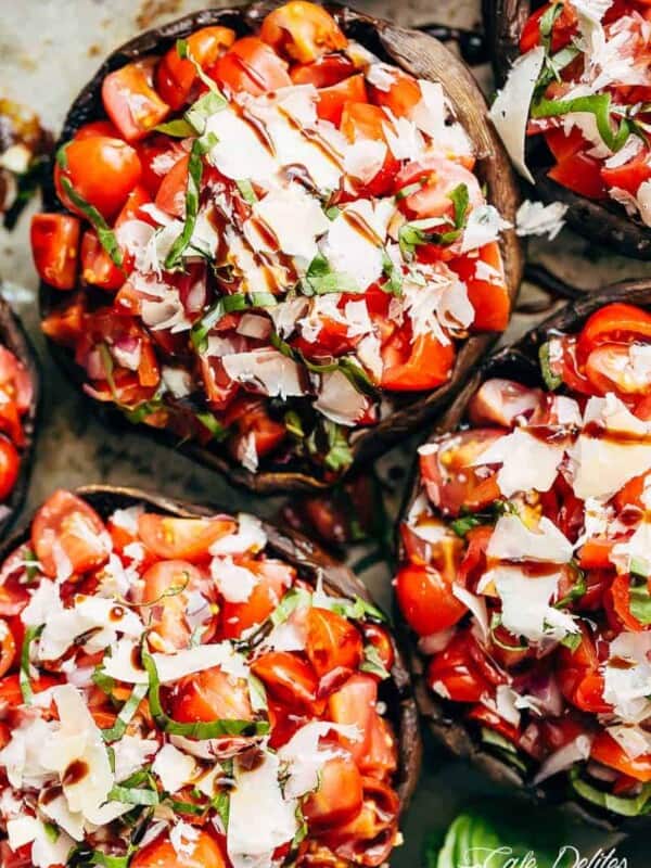 Grilled Bruschetta Portobello Mushrooms smothered in garlic butter
