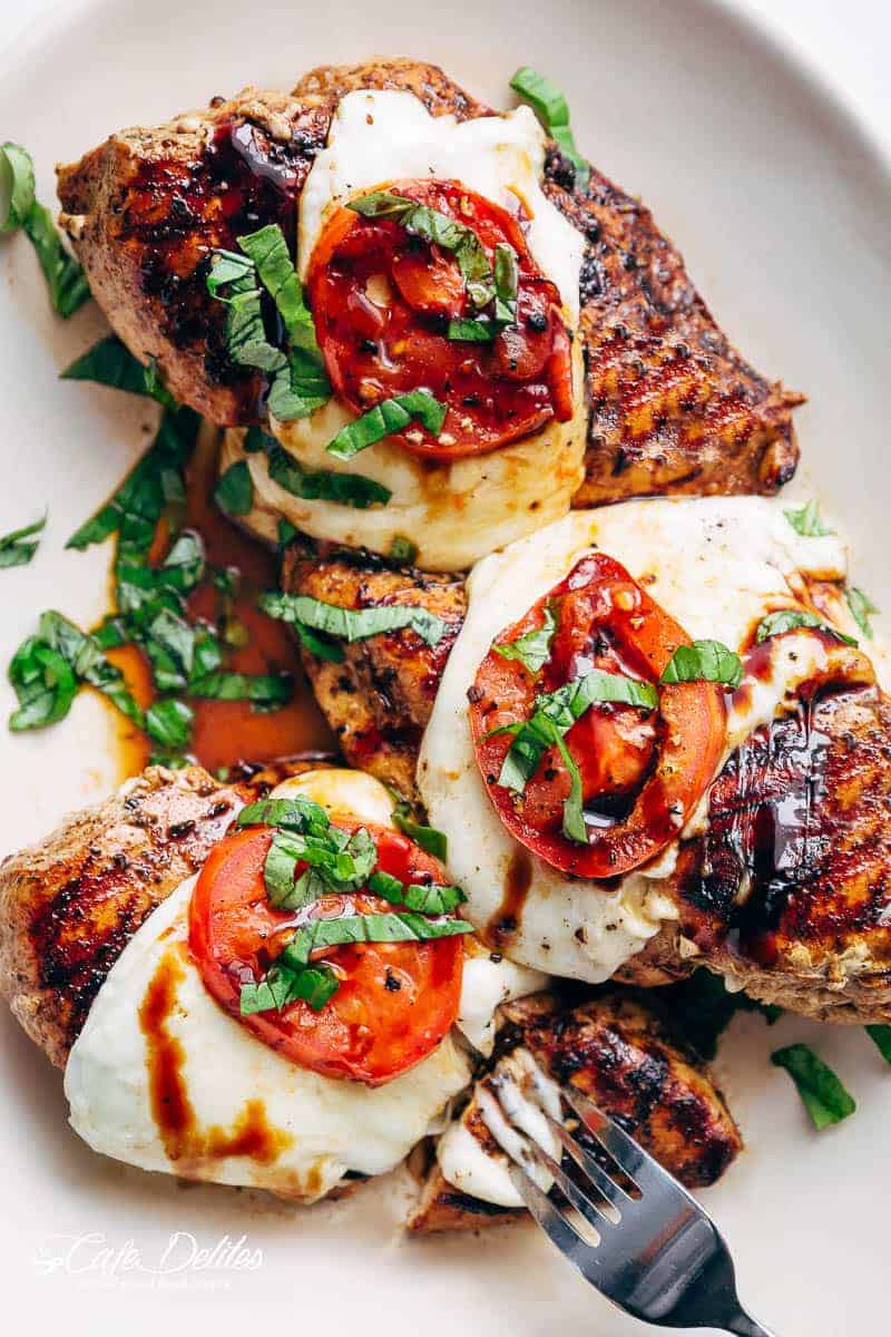 Grilled Chicken Caprese, with soft, creamy Buffalo Mozzarella slices will become a family favourite grilling recipe! A low carb lunch or dinner! | https://cafedelites.com