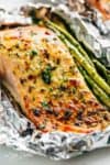 Lemon Parmesan Salmon & Asparagus Foil Packs are so easy to make, and are packed with flavour! Baked OR grilled right on your barbecue! | https://cafedelites.com