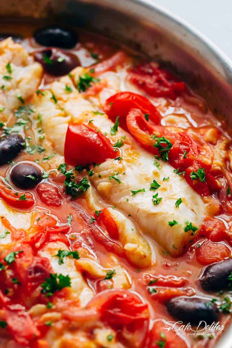 Pan Seared Fish With Tomatoes & Olives is a family favourite and weeknight staple recipe! Light and flavourful, a simple meal in minutes! | https://cafedelites.com