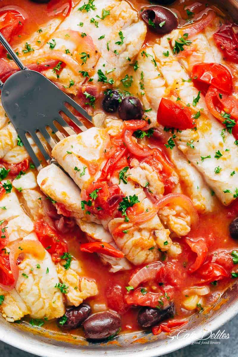 Pan Seared Fish With Tomatoes & Olives is a family favourite and weeknight staple recipe! Light and flavourful, a simple meal in minutes! | https://cafedelites.com