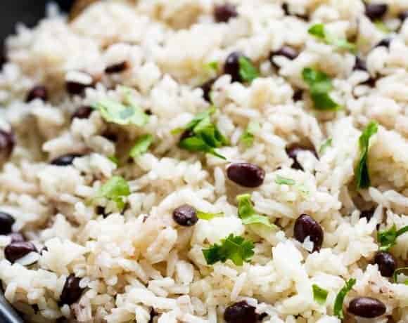 Black Beans & Rice is one of the best side recipes out there! Flavored with a squeeze of lime juice, garlic and spices, this rice recipe is a winner!