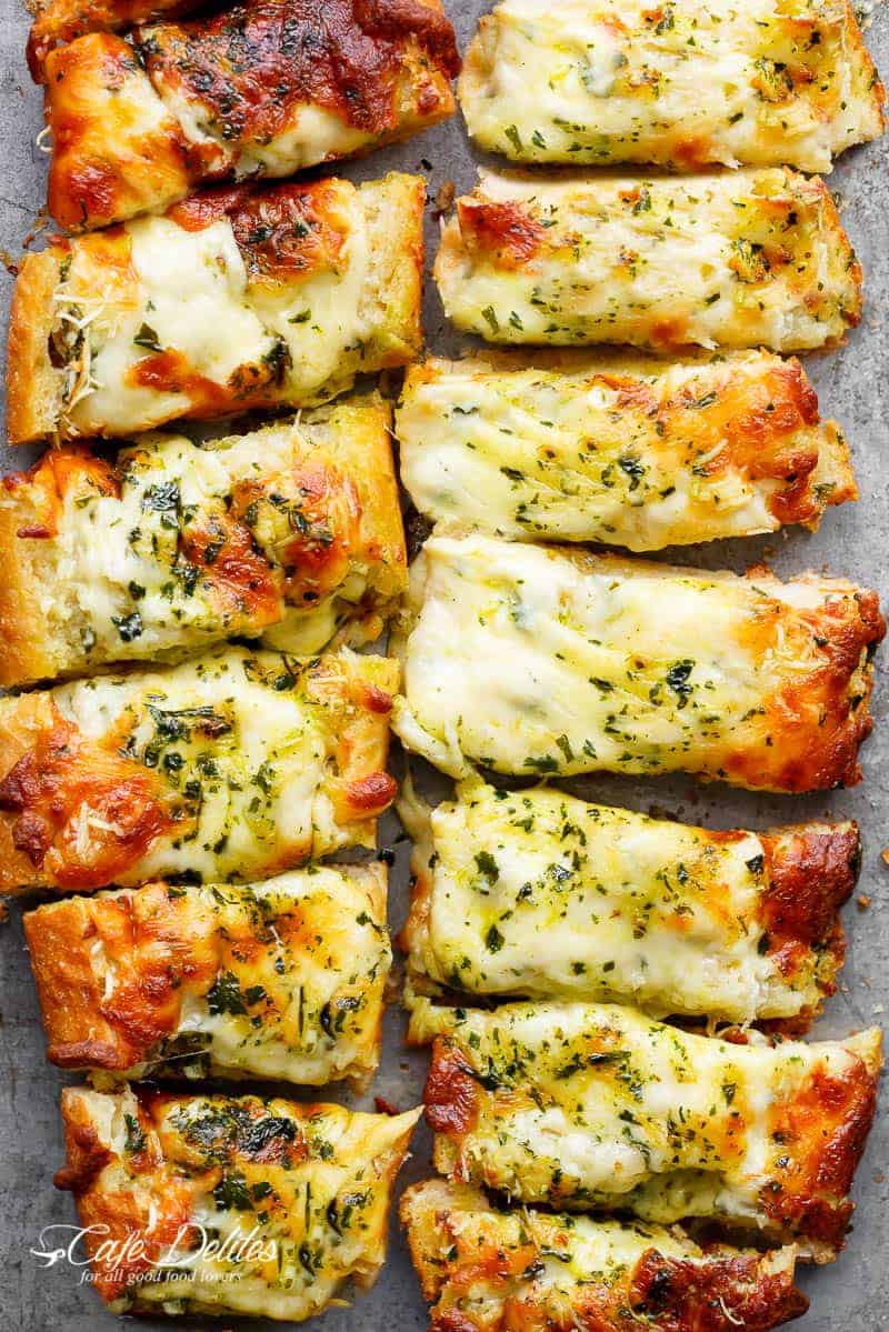 Easy and SUPER Cheesy Garlic Bread can be served as an accompaniment OR as a dish all on i Easy Cheesy Garlic Bread