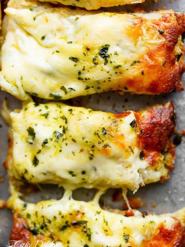 There's regular garlic bread, and then there's THIS Cheesy Garlic Bread! Soft on the inside, crispy on the edges, the perfect cheese/butter/garlic ratio.