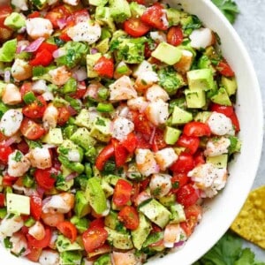 Chunky Shrimp Guacamole pieces in a white bowl