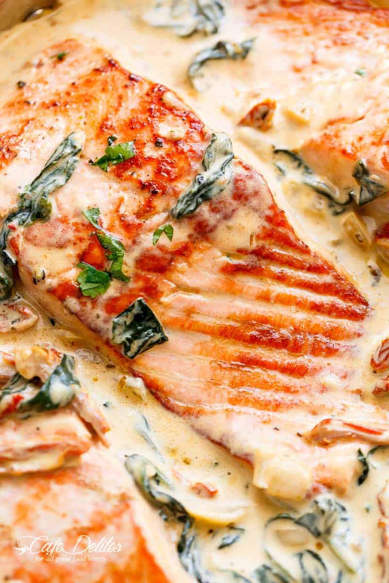 Creamy Garlic Butter Tuscan Salmon is restaurant quality Pan Seared Salmon in a delicious  Creamy Garlic Butter Tuscan Salmon