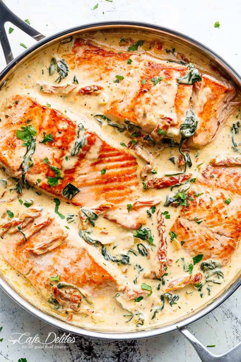 Creamy Garlic Butter Tuscan Salmon is restaurant quality Pan Seared Salmon in a delicious  Creamy Garlic Butter Tuscan Salmon