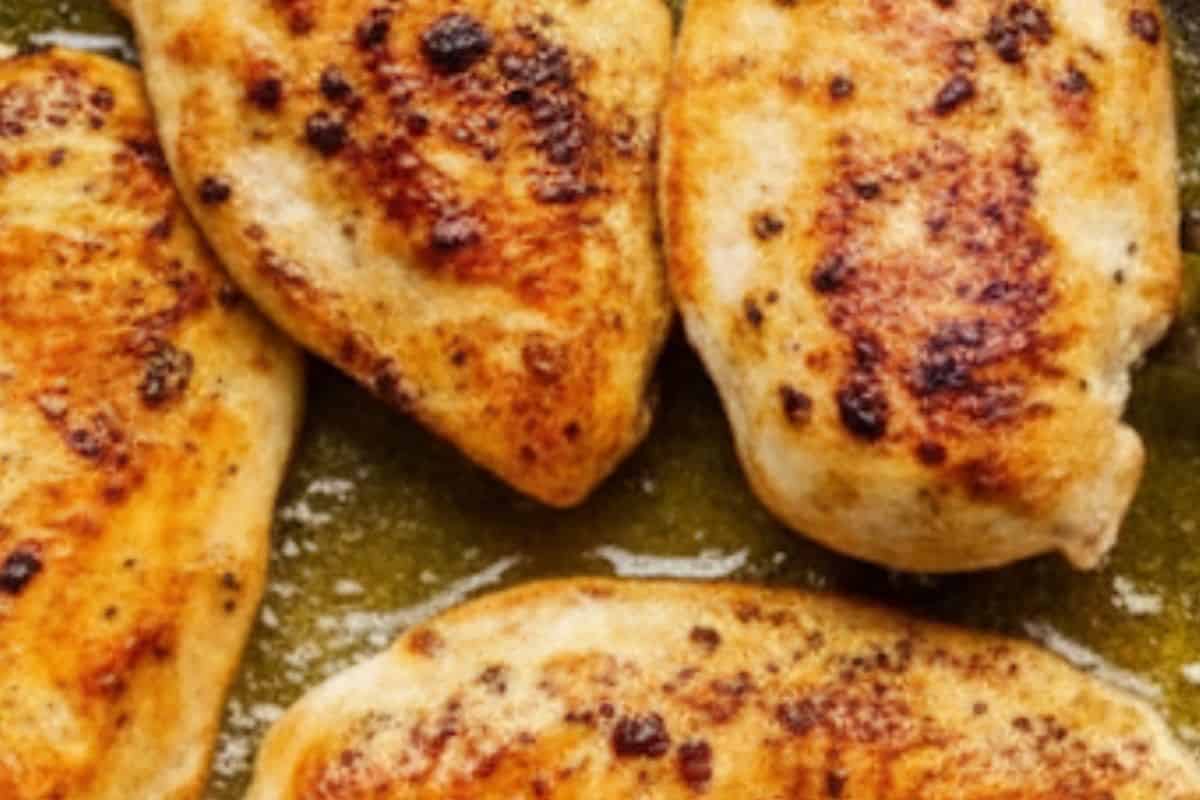 Heat 2 teaspoons olive oil and butter in a skillet over medium-high. Cook the chicken for 6 minutes per side until golden.