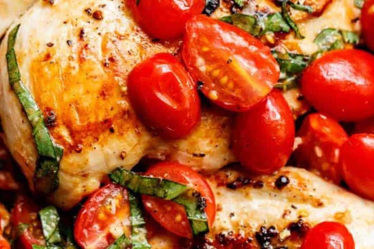 Transfer the chicken to plates with plenty of the tomato basil sauce on top.