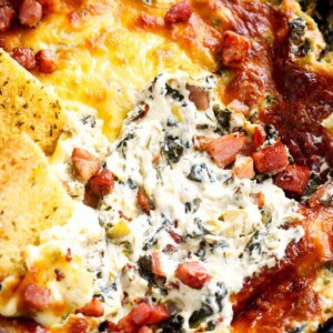 Warm Spinach Bacon Artichoke Dip is a hit around the table! Made with minimal ingredients and topped with crispy bacon, what's not to love!