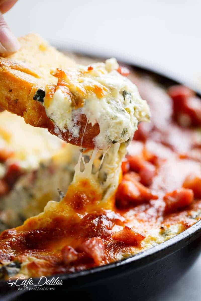 Warm Spinach Bacon Artichoke Dip is a hit around the table Skillet Spinach Bacon Artichoke Dip