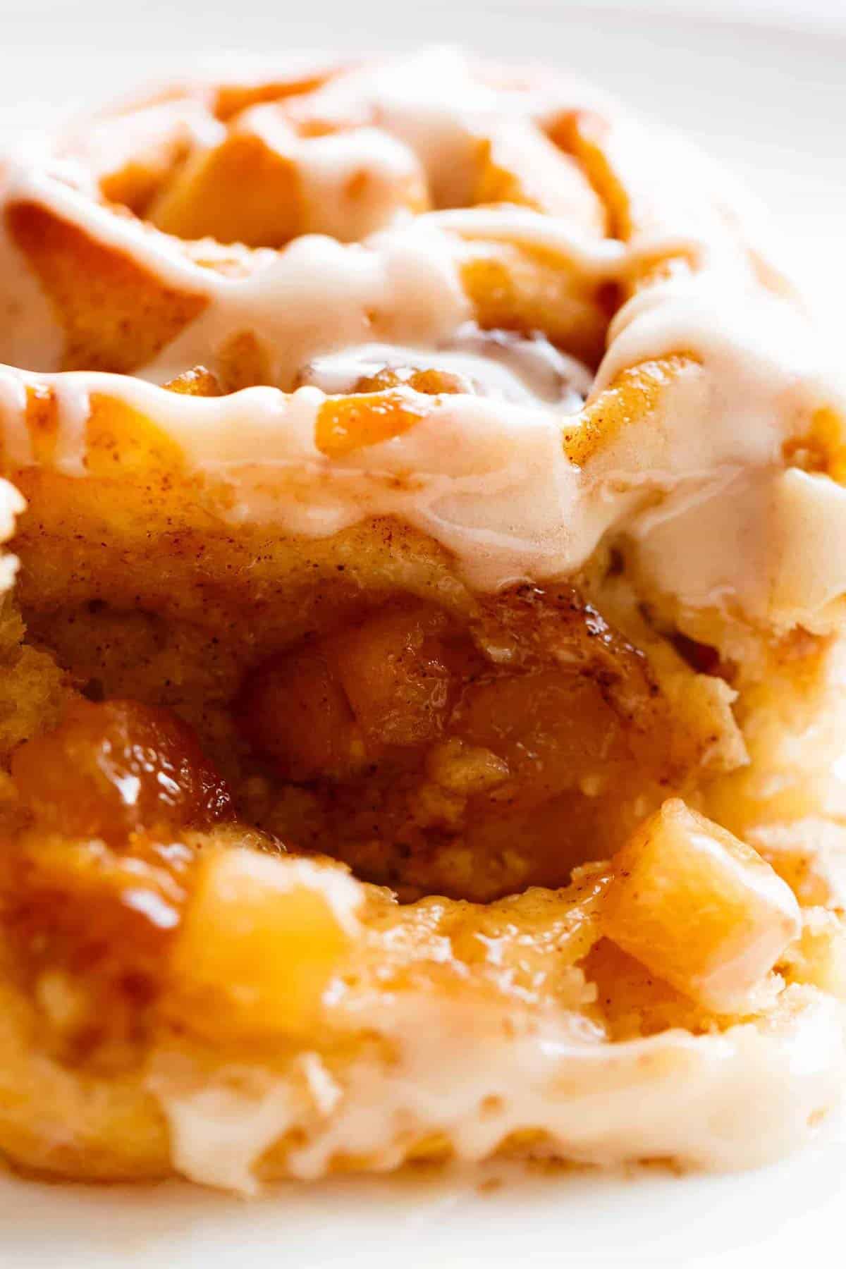 Apple Pie Cinnamon Rolls are soft and fluffy, filled with apple pie filling to make the ultimate twist for your dinner table!