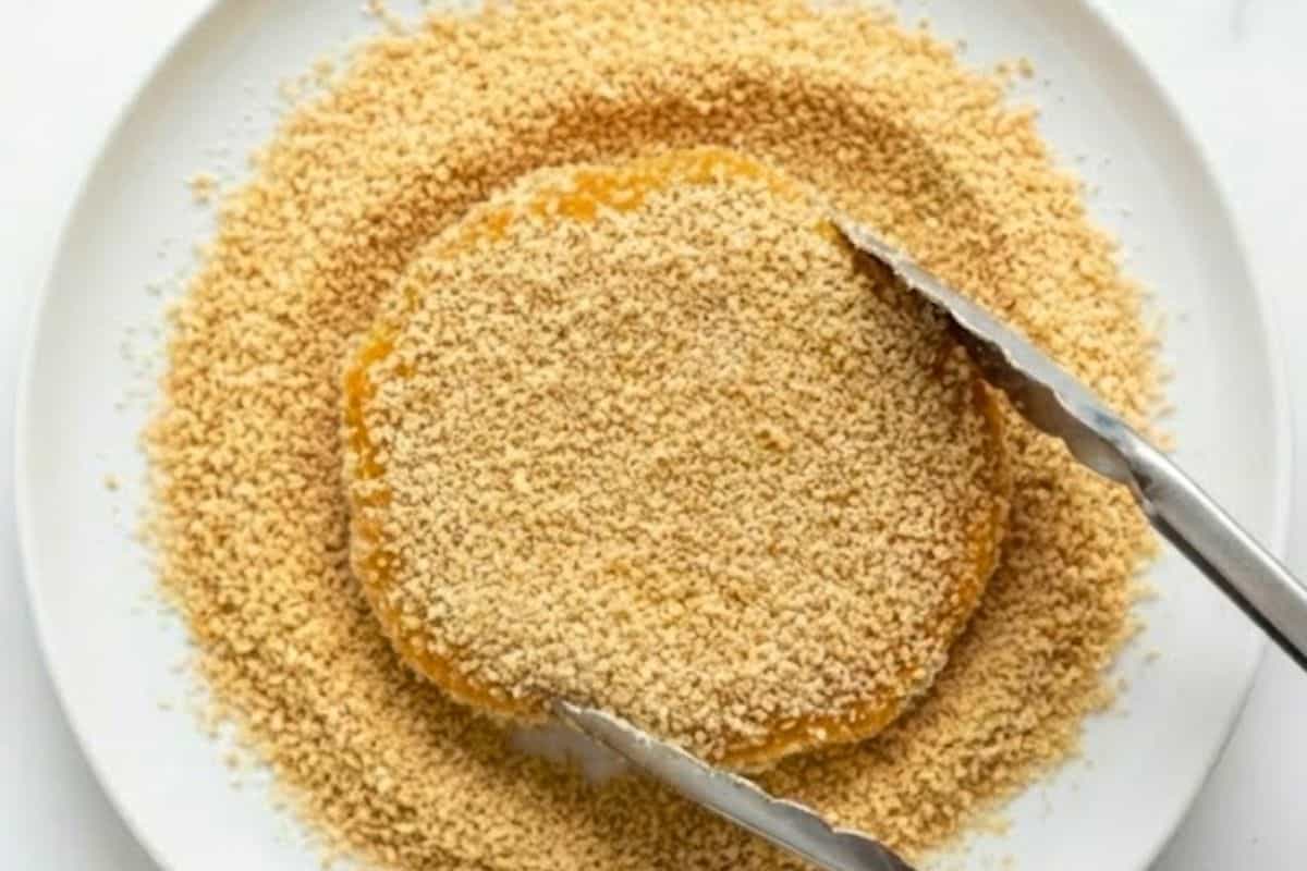 Scoop about 1 tablespoon of mixture and form patties about 1/2 inch thick, then coat evenly in remaining breadcrumbs.