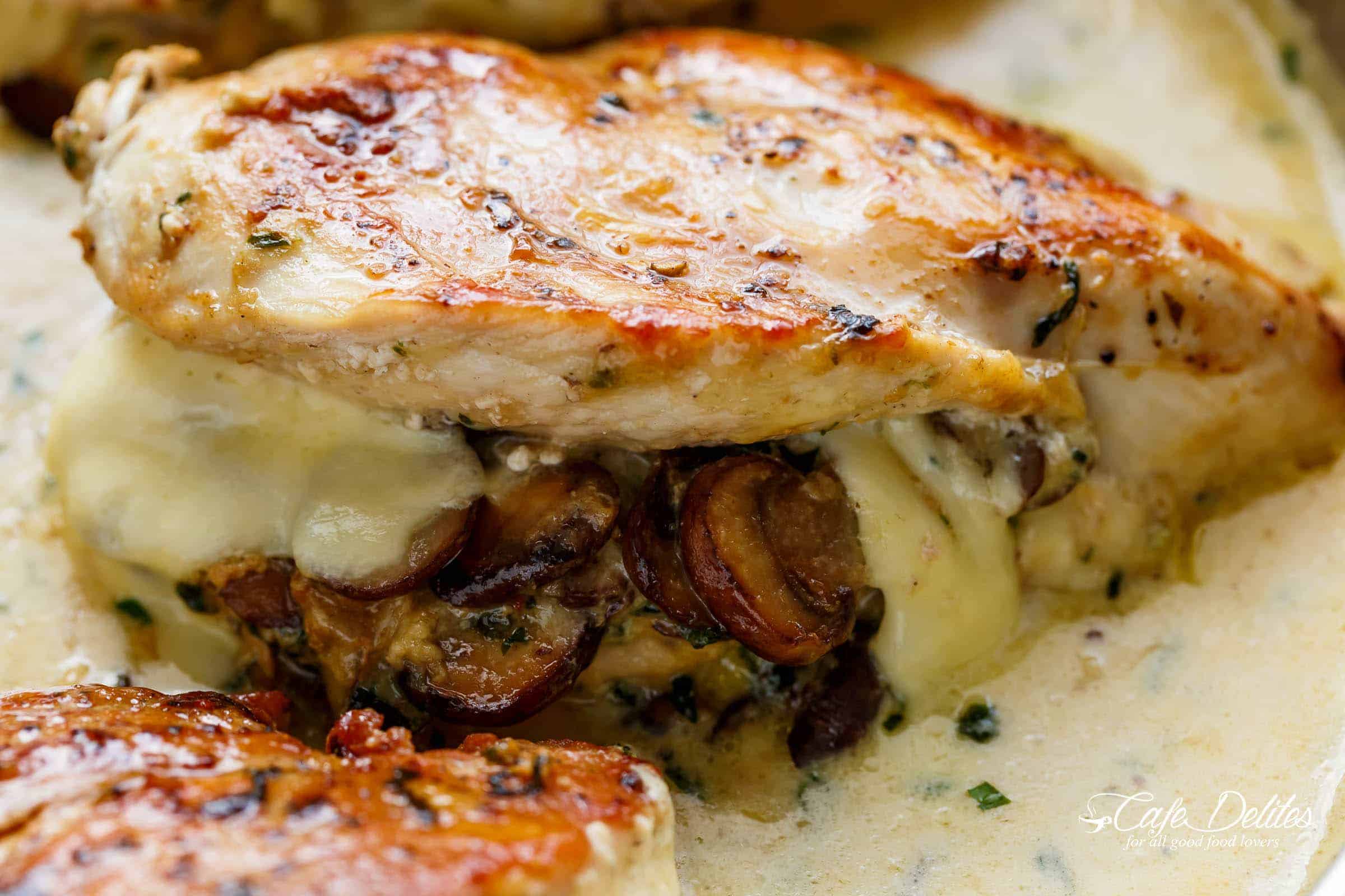 Side view image of Cheesy Garlic Butter Mushroom Stuffed Chicken