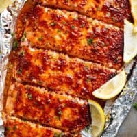 Garlic Butter Honey Mustard Salmon In Foil is a quick and easy salmon recipe, leaving you with no pans to wash and a juicy salmon for your dinner table! | cafedelites.com