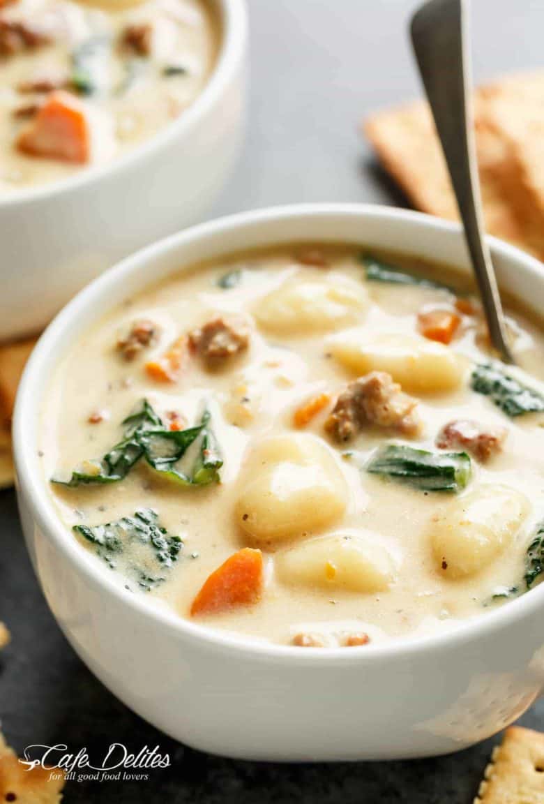 Slow Cooker Creamy Gnocchi Sausage Kale Soup is comfort in a bowl! Almost like a Zuppa Toscana with low fat options and full fat flavours! | cafedelites.com