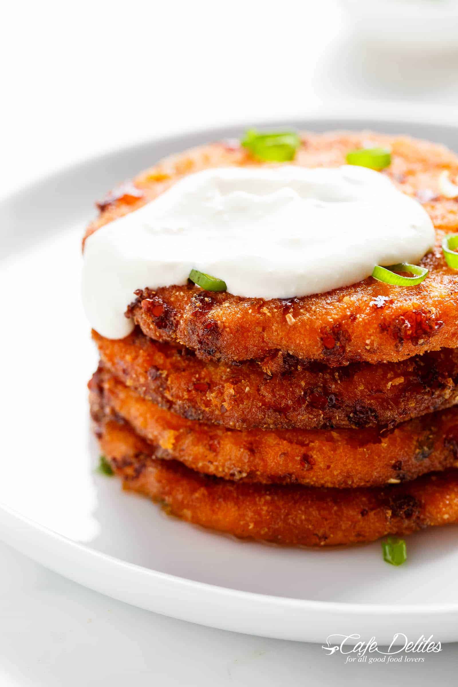 Cheesy Mashed Sweet Potato Cakes are the perfect snack! Cheesy on the inside, so crispy on the outside, and so easy to make! | https://cafedelites.com
