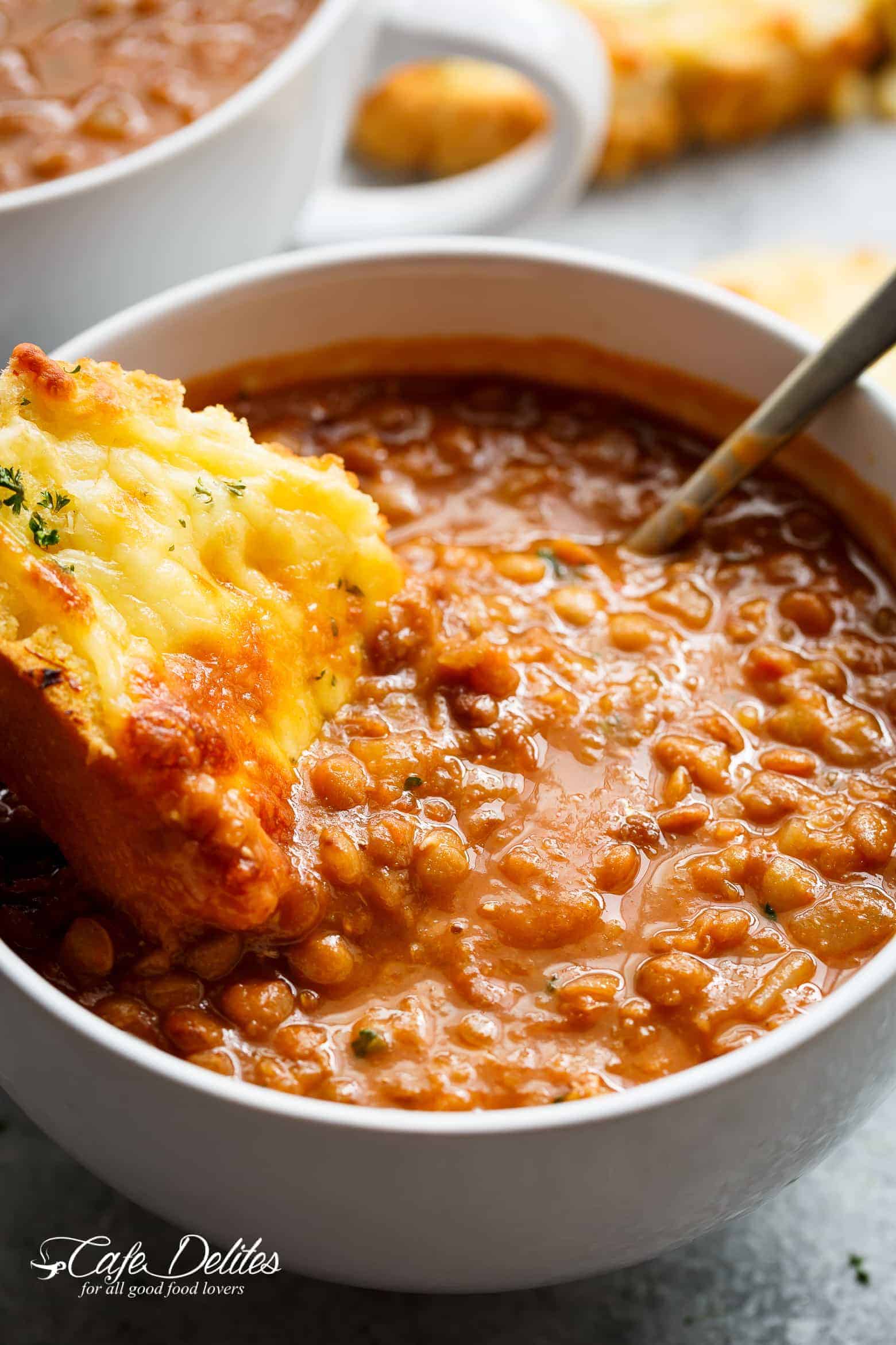 Lentil soup and garlic bread its comfort in a bowl! | cafedelites.com